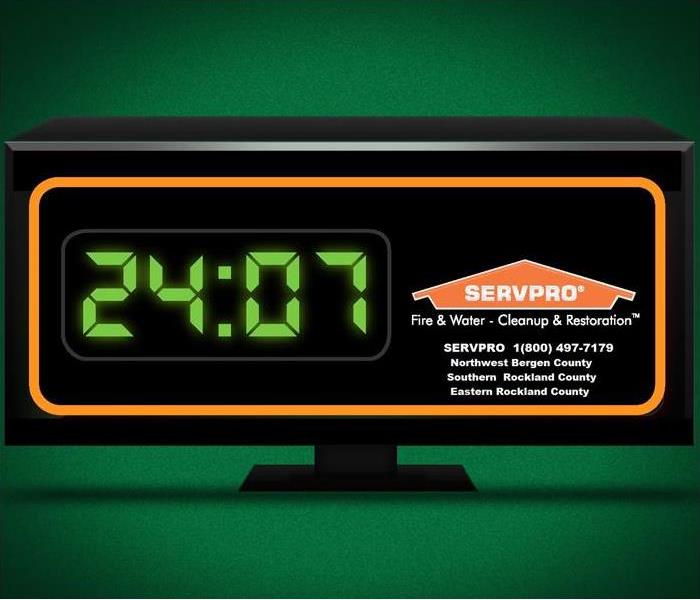 SERVPRO clock showing availability 24/7